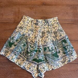Zimmermann Linen Shorts in a distinctive green paisley placement print. Size 1